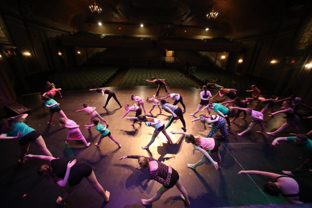 Dancers stretching on Capitol Stage